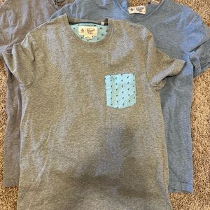 An original Penguin Bundle of 3 men’s shorts leave tees